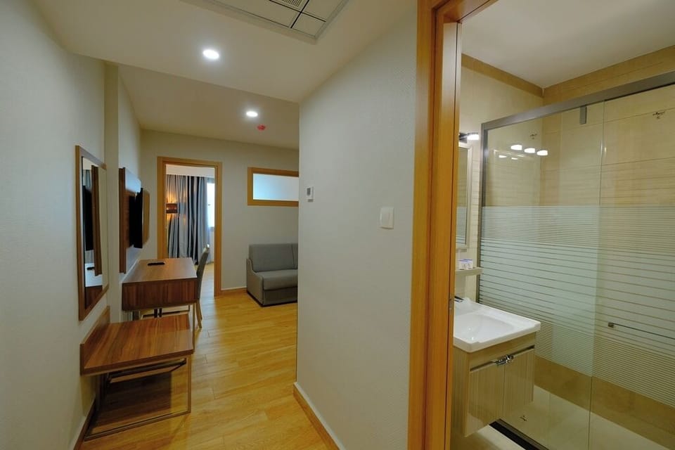 Classic Suite, City View | Desk, laptop workspace, soundproofing, iron/ironing board
