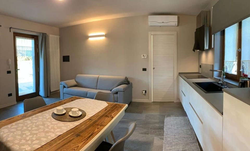 Superior Apartment, Garden View | Living area | 37-inch flat-screen TV with satellite channels, TV