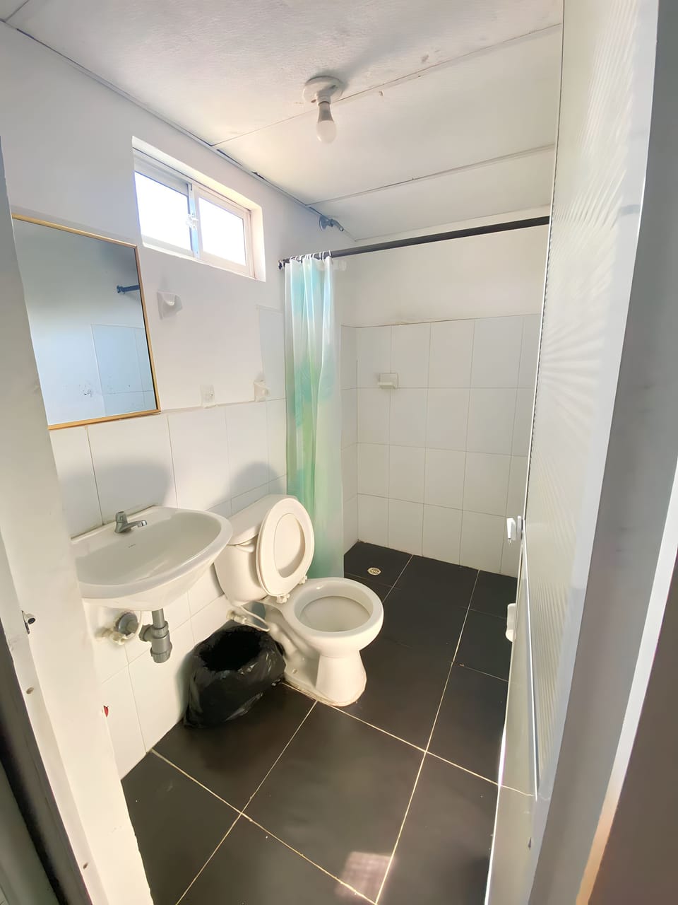 Shower, towels, soap, toilet paper