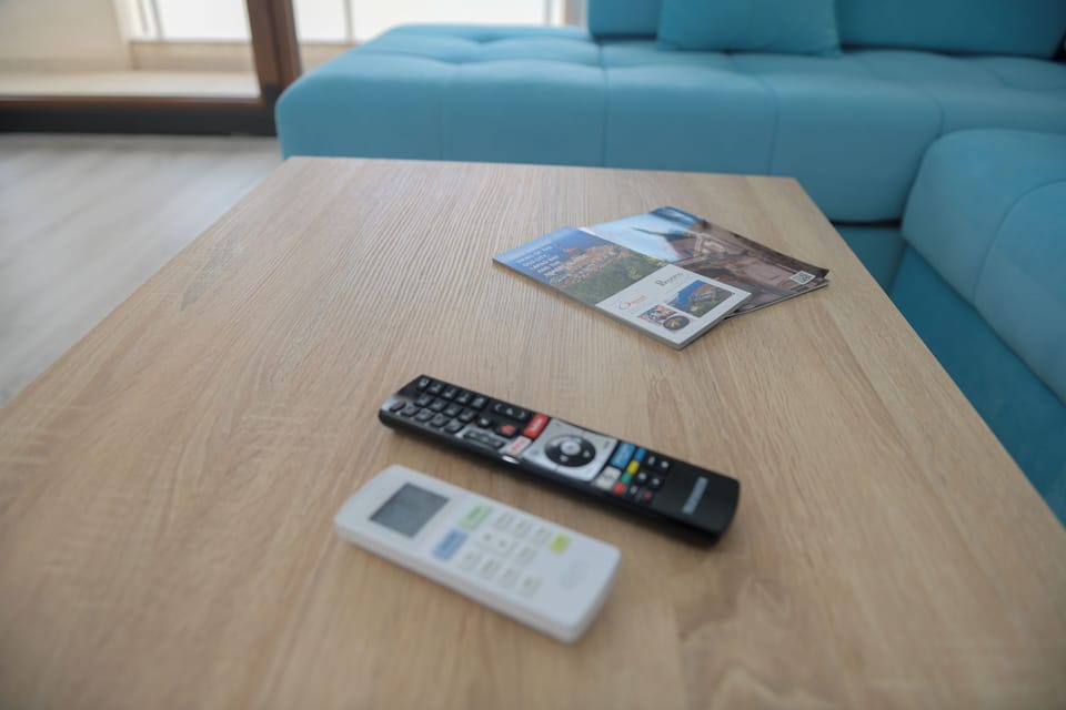 Flat-screen TV, video-game console