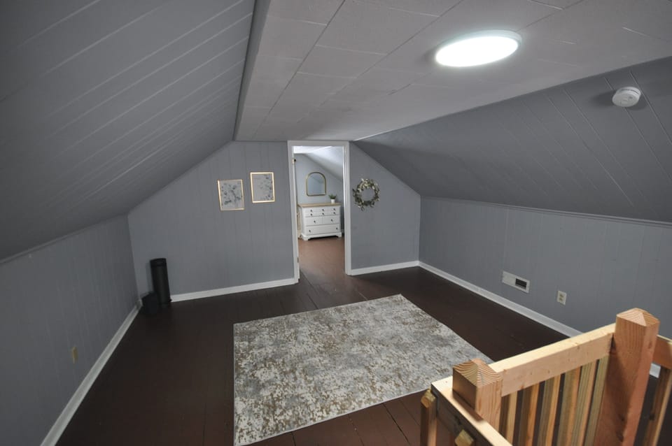 Bonus room upstairs with dedicated work desk and chair