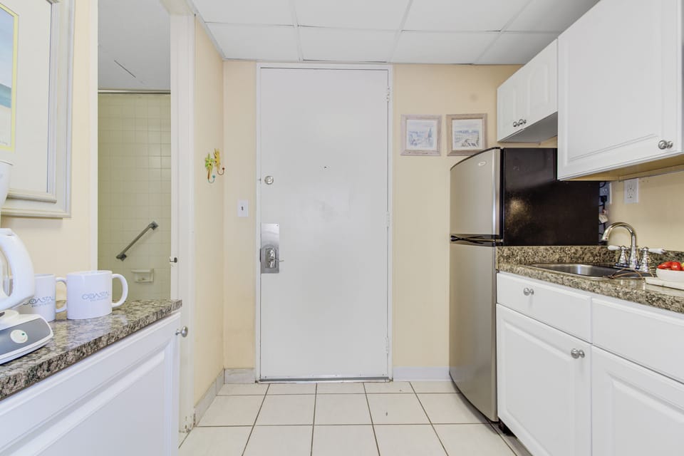 Enjoy the convenience of a fully equipped kitchen, perfect for preparing your favorite meals during your stay.