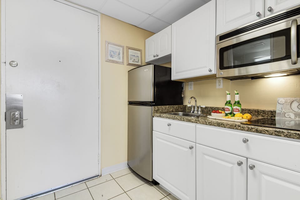 Enjoy the convenience of a fully equipped kitchen, perfect for preparing your favorite meals during your stay.