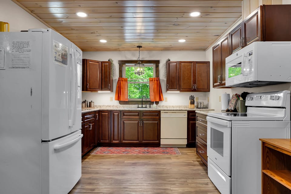 This fully-stocked kitchen has everything you need, sure to thrill the chef in your group! With top-notch amenities and ample space, it's the perfect spot to cook up something amazing.
