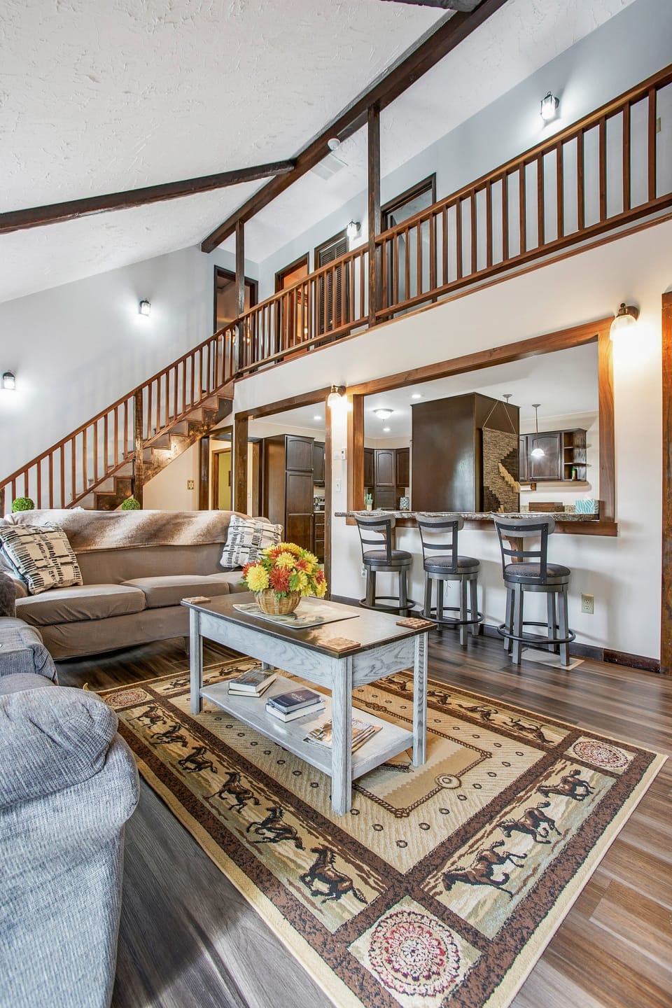Kitchen island seats 3!

Step into the cozy living room with plenty of seating for the group. This well lit space beckons you to kick your feet up and relax.