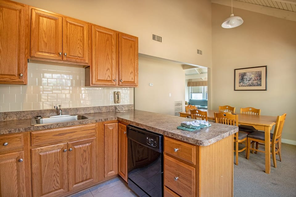 Full Kitchen includes refrigerator, microwave, oven, 