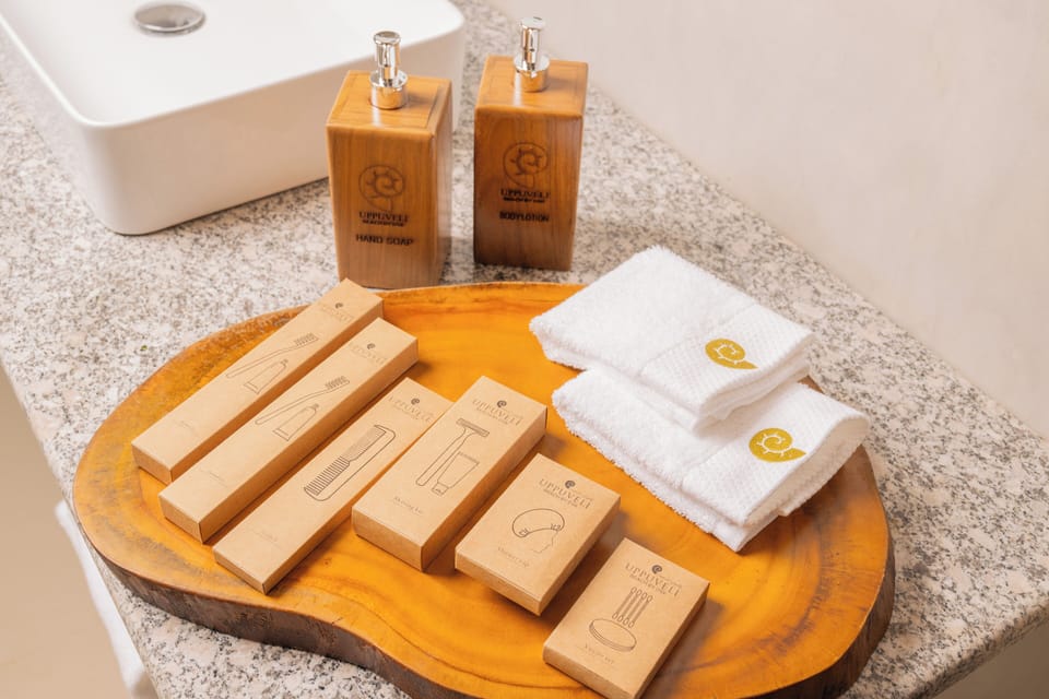 Garden Bliss | Bathroom | Shower, rainfall showerhead, designer toiletries, hair dryer