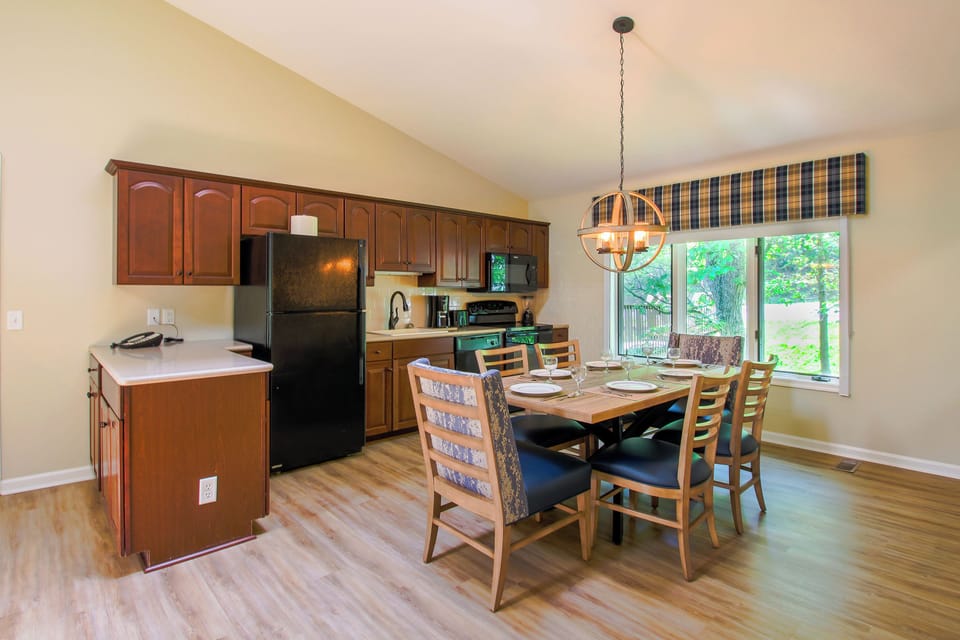 Full kitchen and dining area