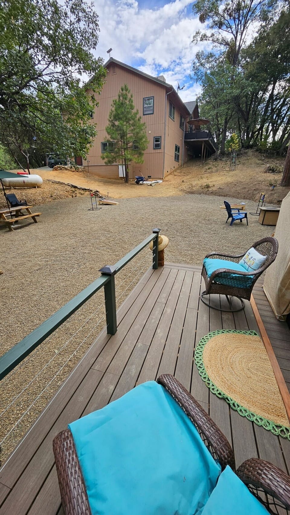 View of the yard with the entrance to the cottage in background