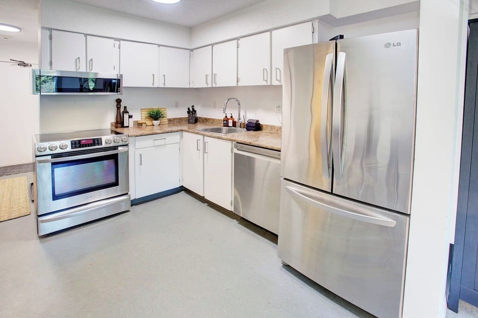 FULLY stocked kitchen with all the comforts of home! New, upgraded stainless steel appliances will make your cooking experience enjoyable.