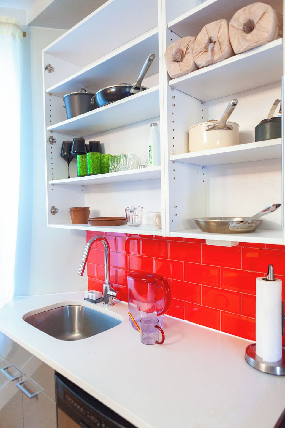 Full kitchen stocked with all essential cooking and dinnerware items.
