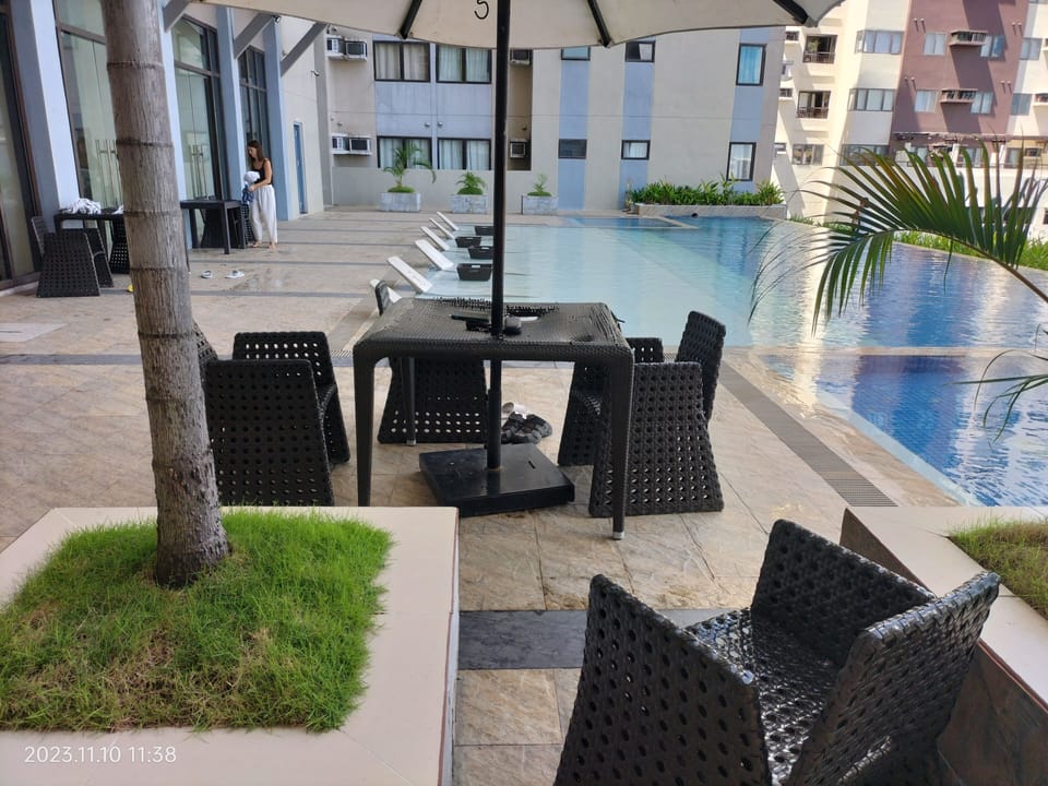 2 outdoor pools, open 8:00 AM to 6:00 PM, pool umbrellas