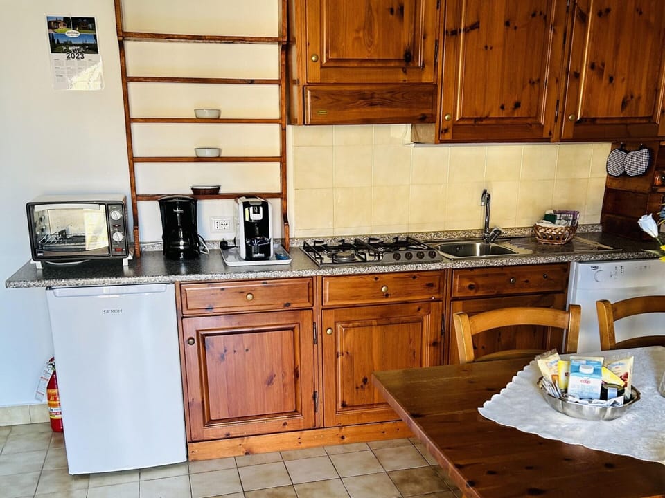 Apartment | Private kitchen | Stovetop, highchair