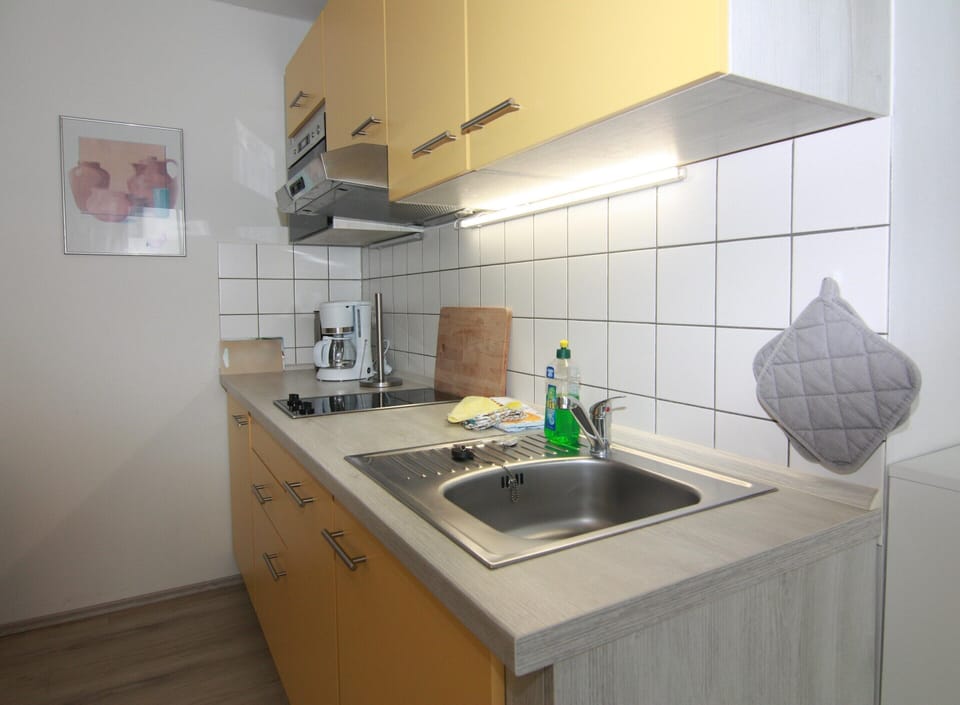 Apartment | Private kitchen | Electric kettle, toaster, highchair