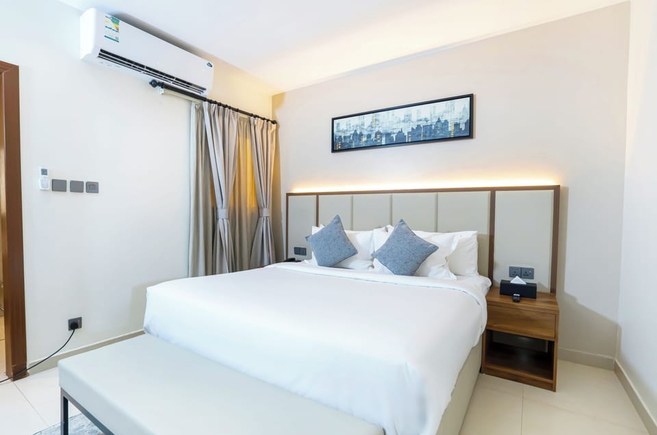 Signature Suite | In-room safe, individually furnished, laptop workspace, blackout drapes