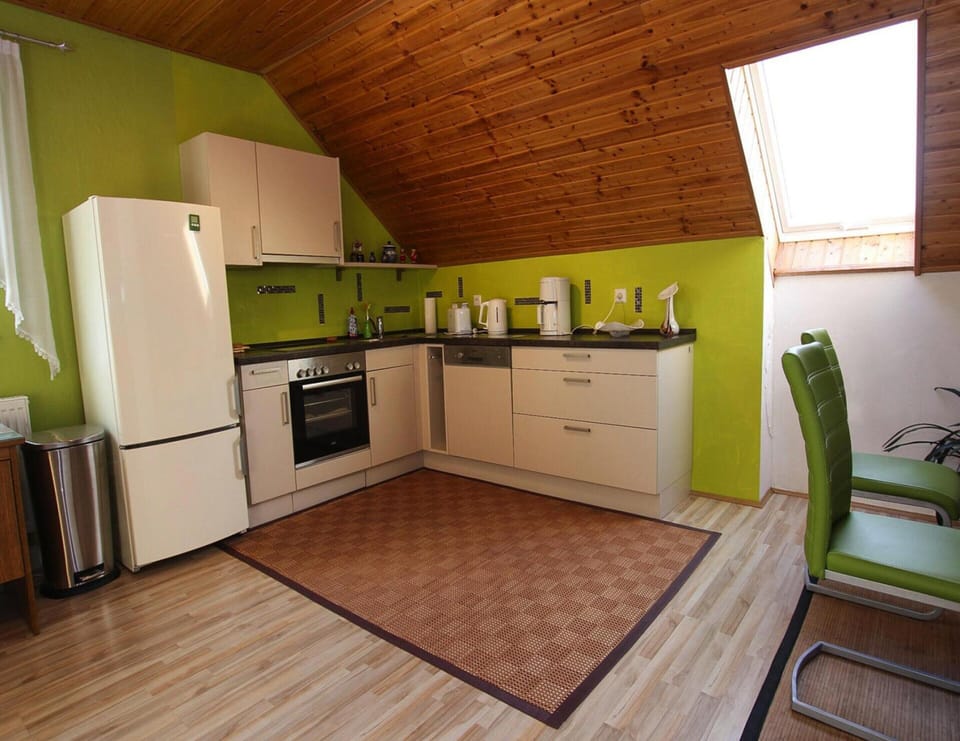 Apartment | Private kitchen | Stovetop, electric kettle, toaster, highchair