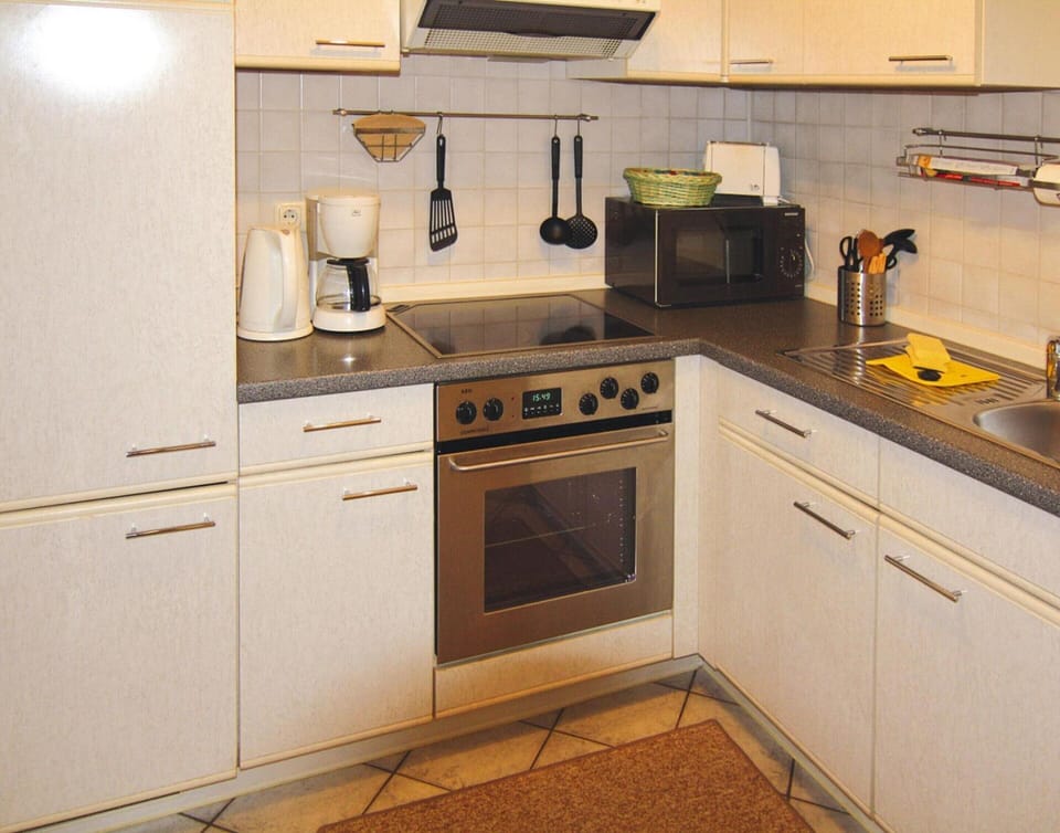Apartment | Private kitchen | Electric kettle, toaster, highchair