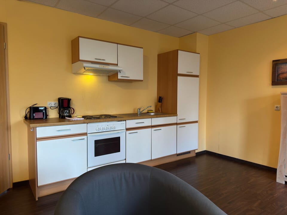 Apartment | Private kitchen | Electric kettle, toaster, highchair