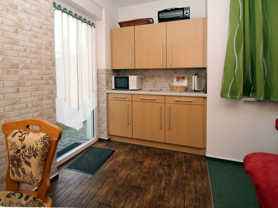 Apartment | Private kitchen | Electric kettle, toaster, highchair