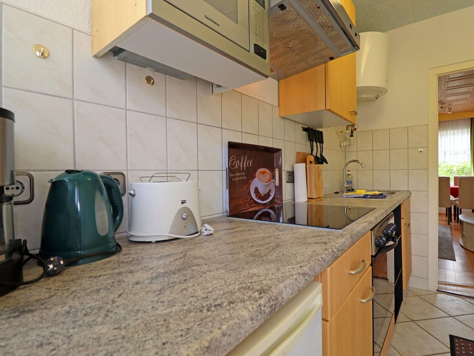 Bungalow | Private kitchen | Toaster, highchair