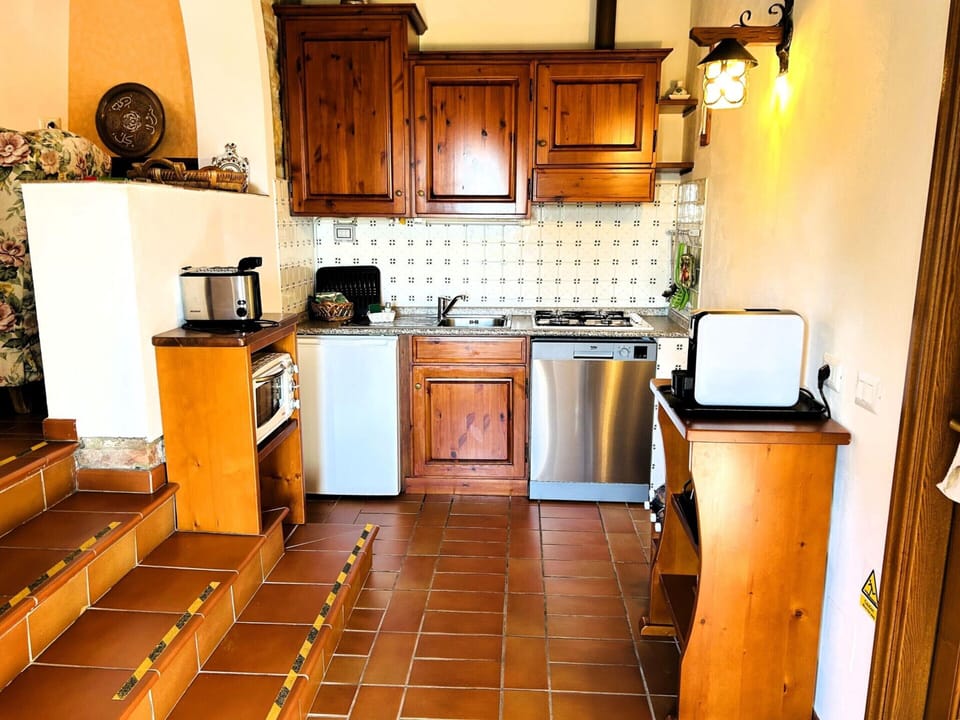 Apartment | Private kitchen | Stovetop, highchair