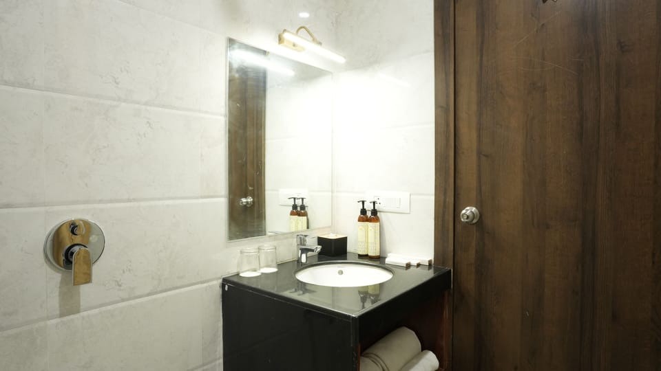 Shower, slippers, bidet, towels