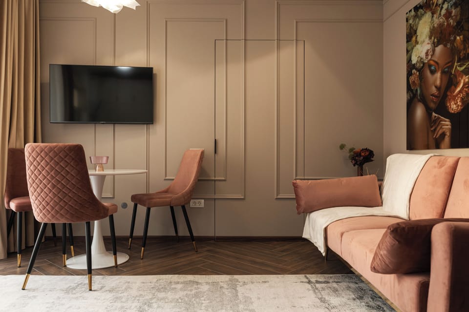 Deluxe Apartment, Balcony | Living area | Flat-screen TV