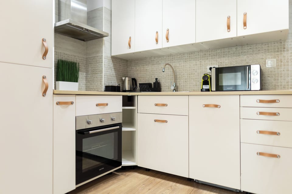 Full-size fridge, microwave, oven, coffee grinder