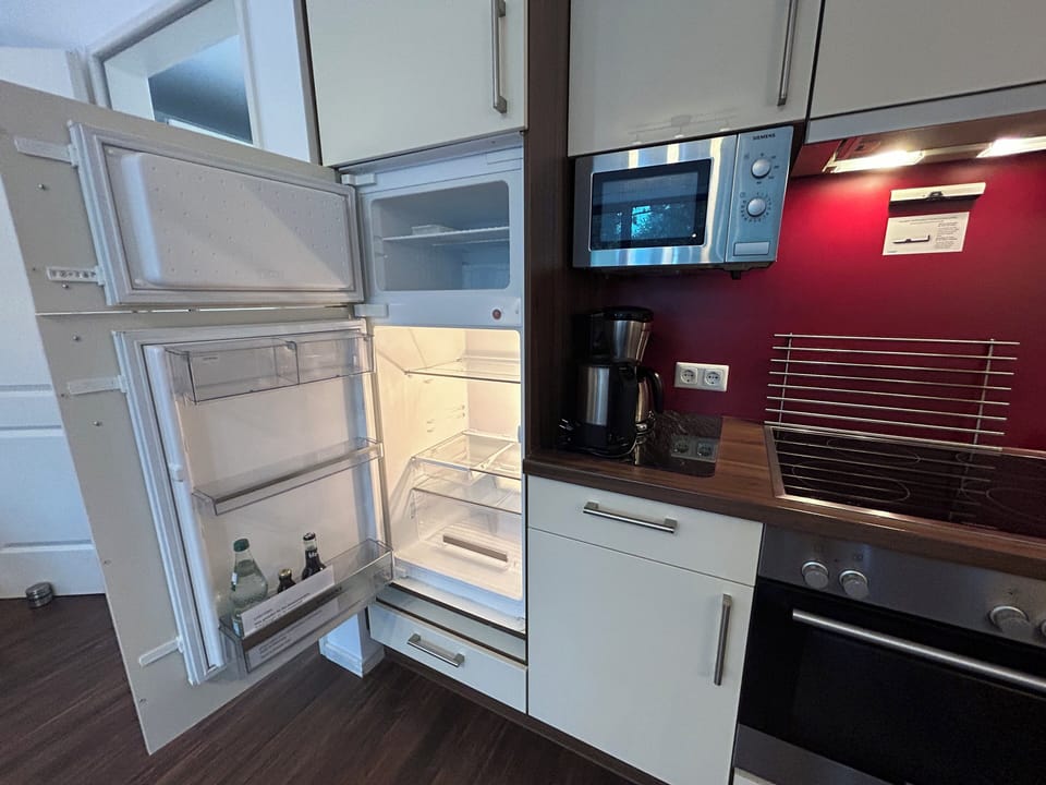Apartment | Private kitchen | Fridge, stovetop, dishwasher, espresso maker