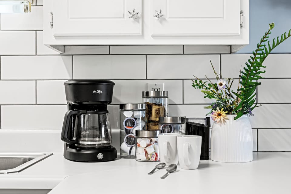 Enjoy your fully stocked coffee bar with regular and decaf coffee, filters. 