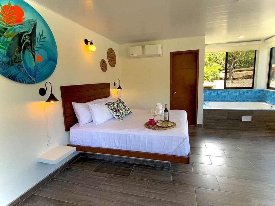 Suite, Pool View | In-room safe, blackout drapes, free WiFi