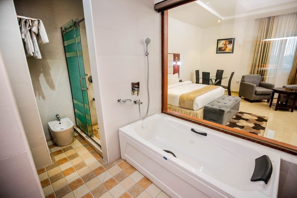 Combined shower/tub, hair dryer, towels, soap