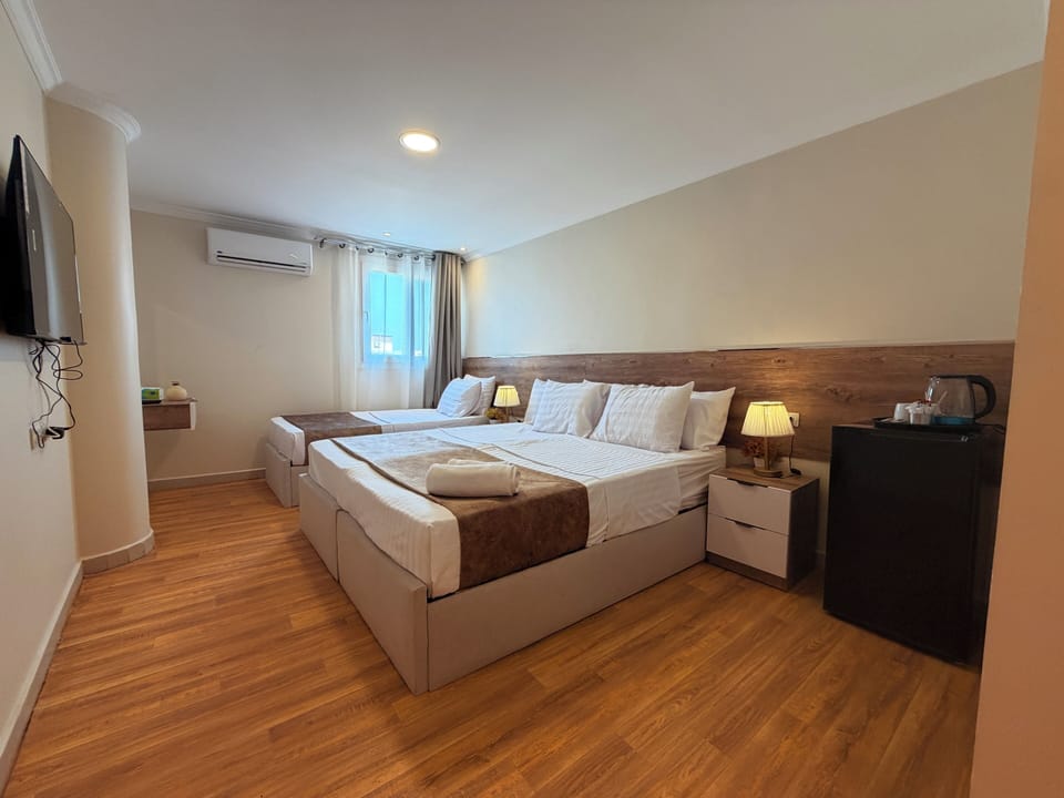 Hypo-allergenic bedding, down comforters, laptop workspace
