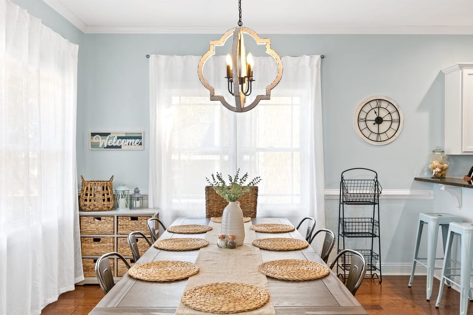 Welcome to Sixteen Sandals! Enjoy meals and games at the table that comfortably seats 8. The nearby bar seats 4 more. Tiered baskets and basket organizer provide space for fruit, vegetables, b