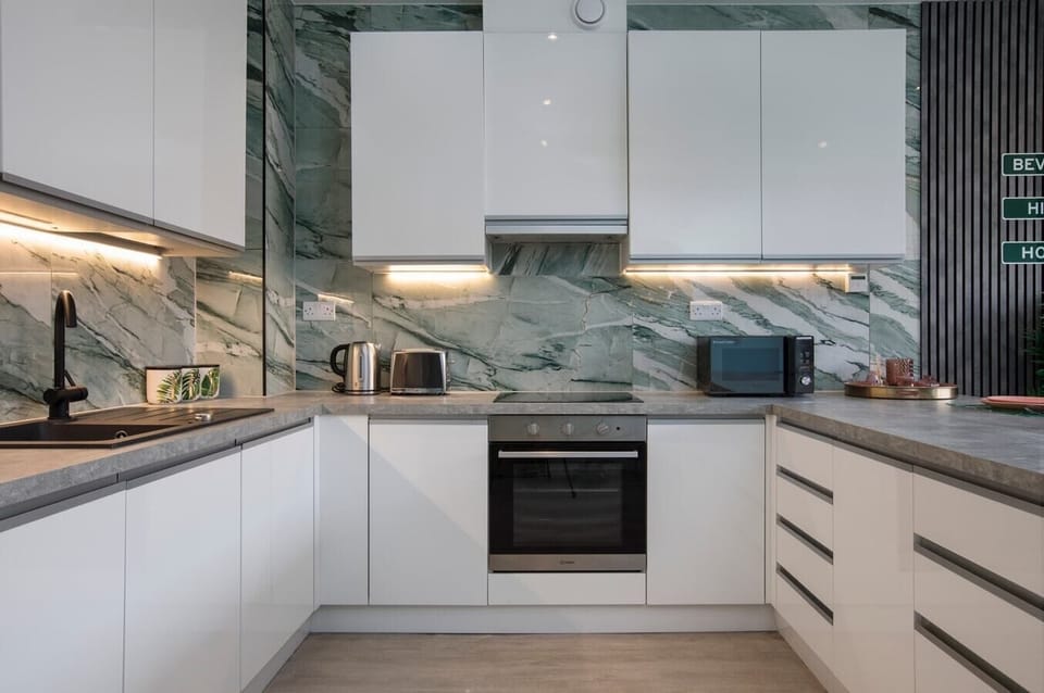 Integrated living and kitchen spaces in an open layout.