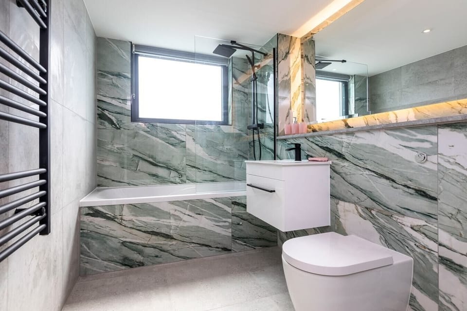 Bathroom with shower over bath