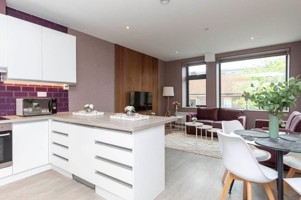 Integrated living and kitchen spaces in an open layout.