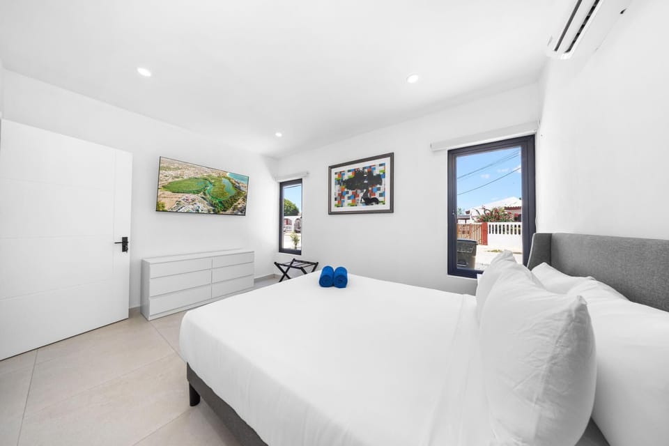 Step into the grandeur of our expansive property, featuring large doors that lead to a spacious area.
