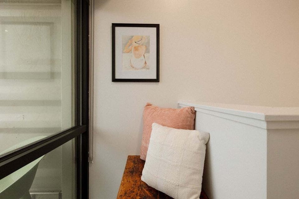 Unwind in this peaceful corner designed for reading, journaling, or enjoying a quiet moment before heading out to explore Oak Island and Wilmington.