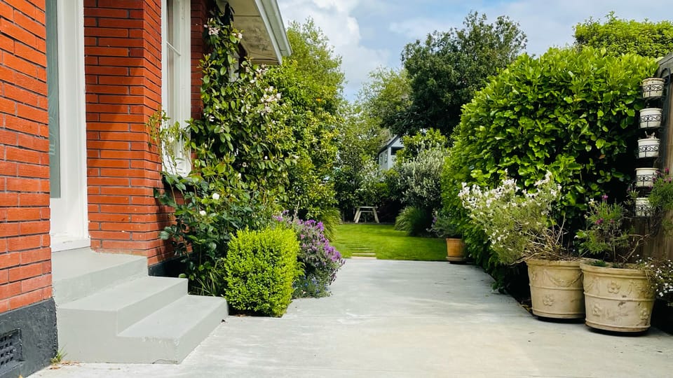 View to backgarden where cabin pathway begins (Spring).