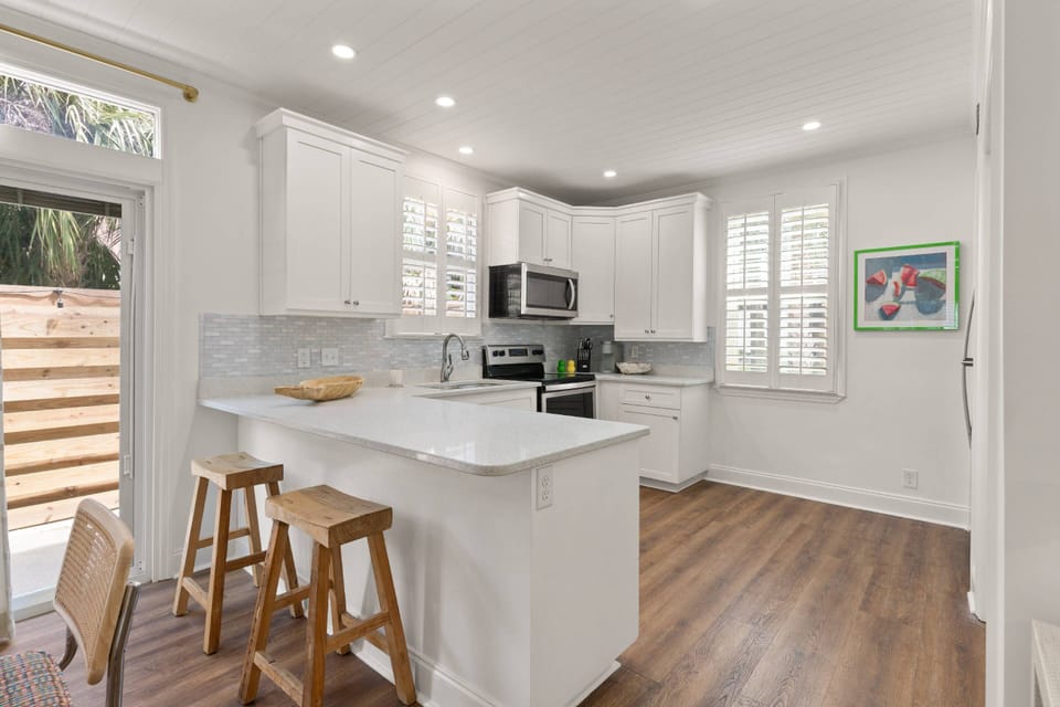 Enjoy this beautiful fully stocked open kitchen with everything you need to cook with during your stay.