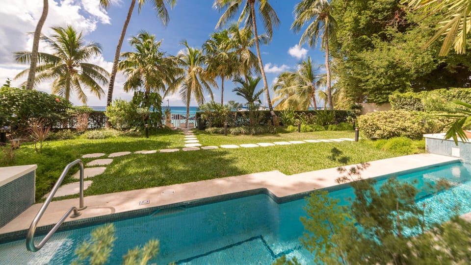 Amenities include access to a communal pool