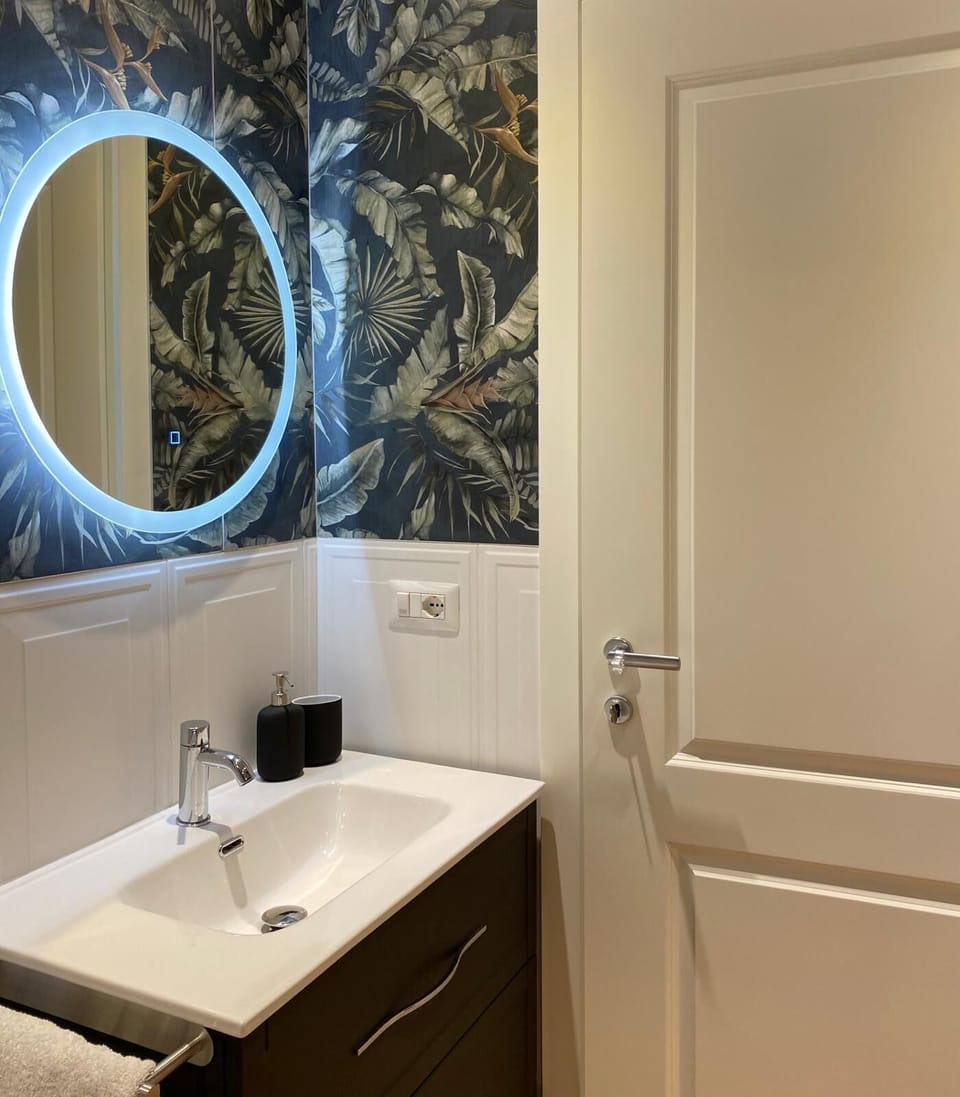 Shower, rainfall showerhead, bidet, towels