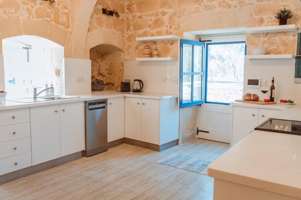 Villa | Private kitchen | Fridge, microwave, oven, stovetop