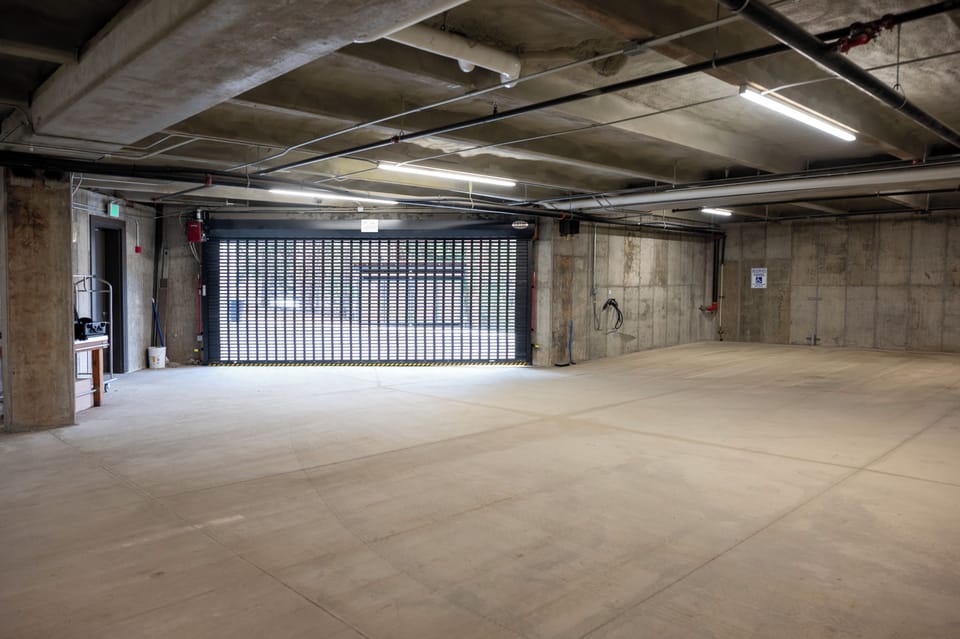 - Covered garage with secure gated entry access   - Spacious indoor parking for guest convenience   - Safe and private space for your vehicle during stay