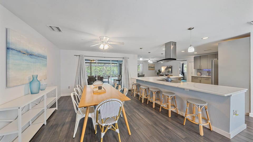 Plenty of seating in the kitchen and dining room areas.