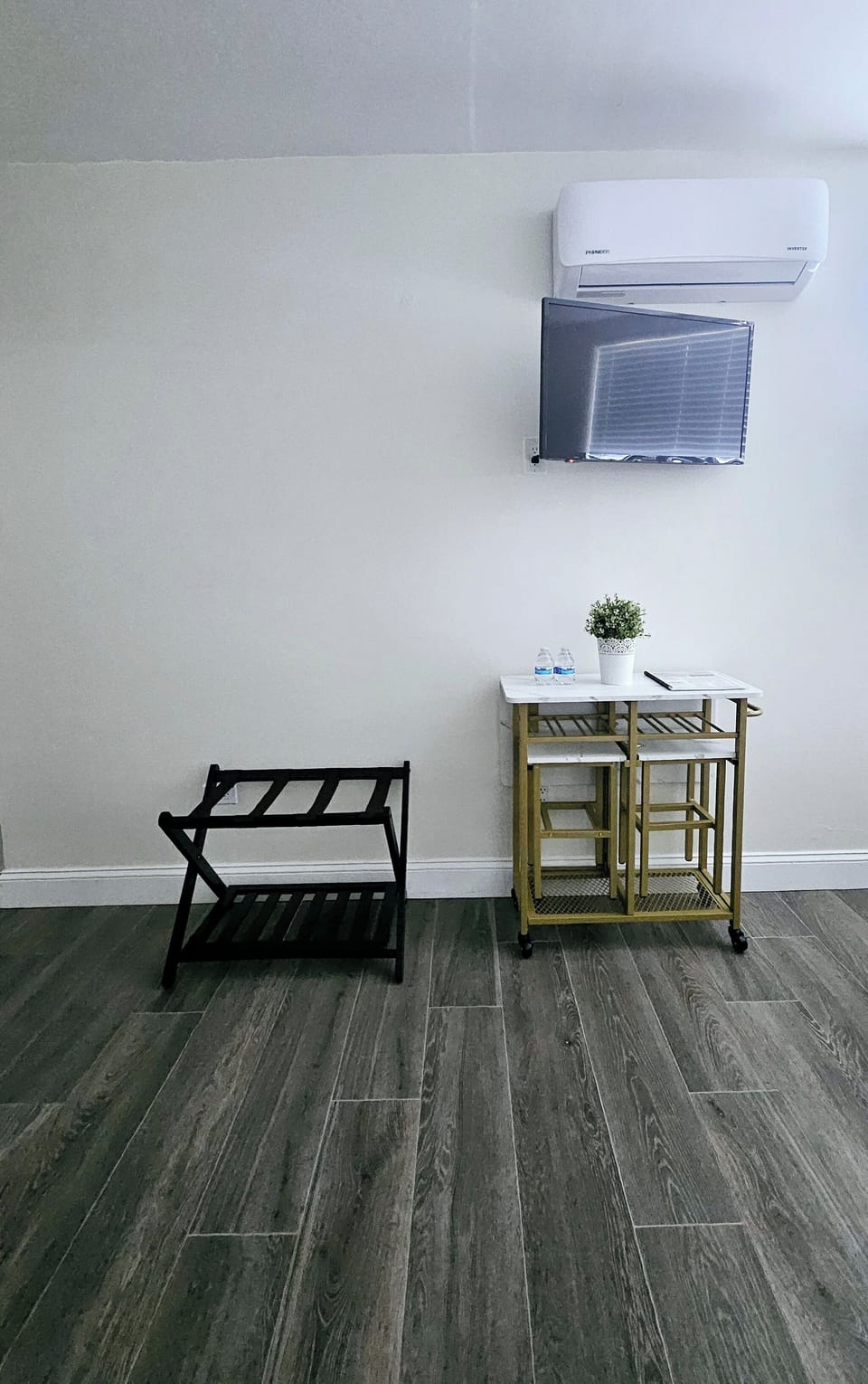 Enjoy dining space with TV and luggage rack. 