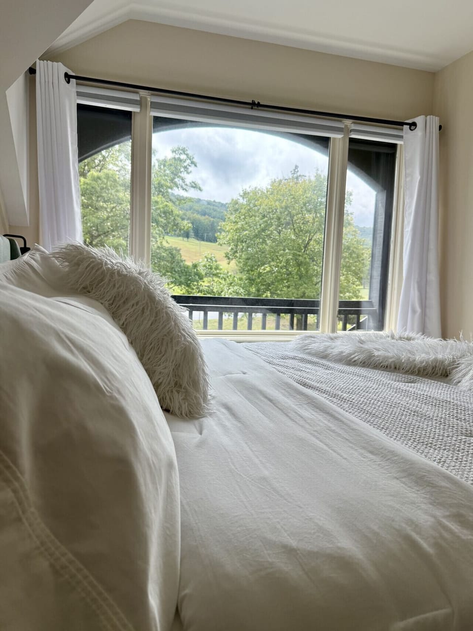 King size bedroom with a view of sunset chair and the slopes!