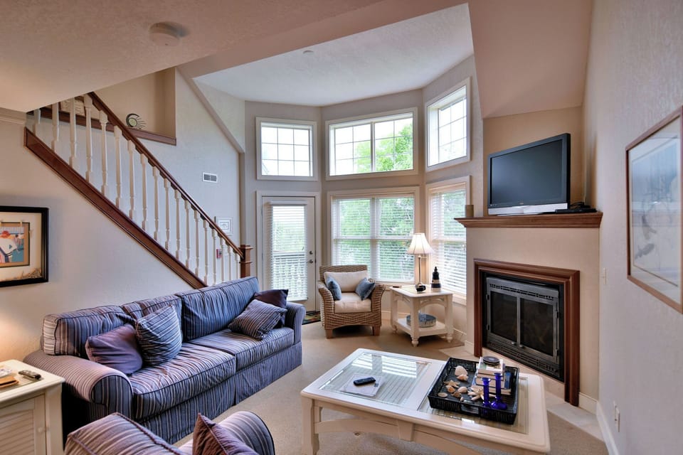 Condo, Multiple Beds, Fireplace, Golf View (Unit 207 2 BDRM/ 2 BA) | Living area | 42-inch TV with cable channels