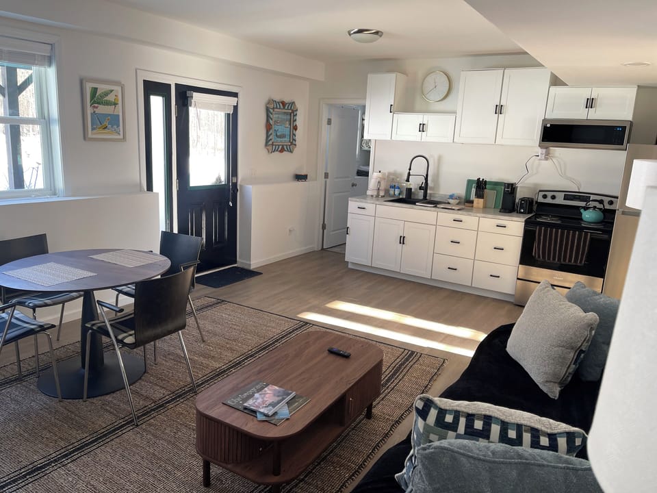 Living Area and Dining Area.
